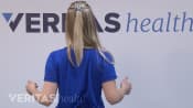 Woman doing a scapula retraction.